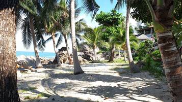 Private beach nearby, black sand