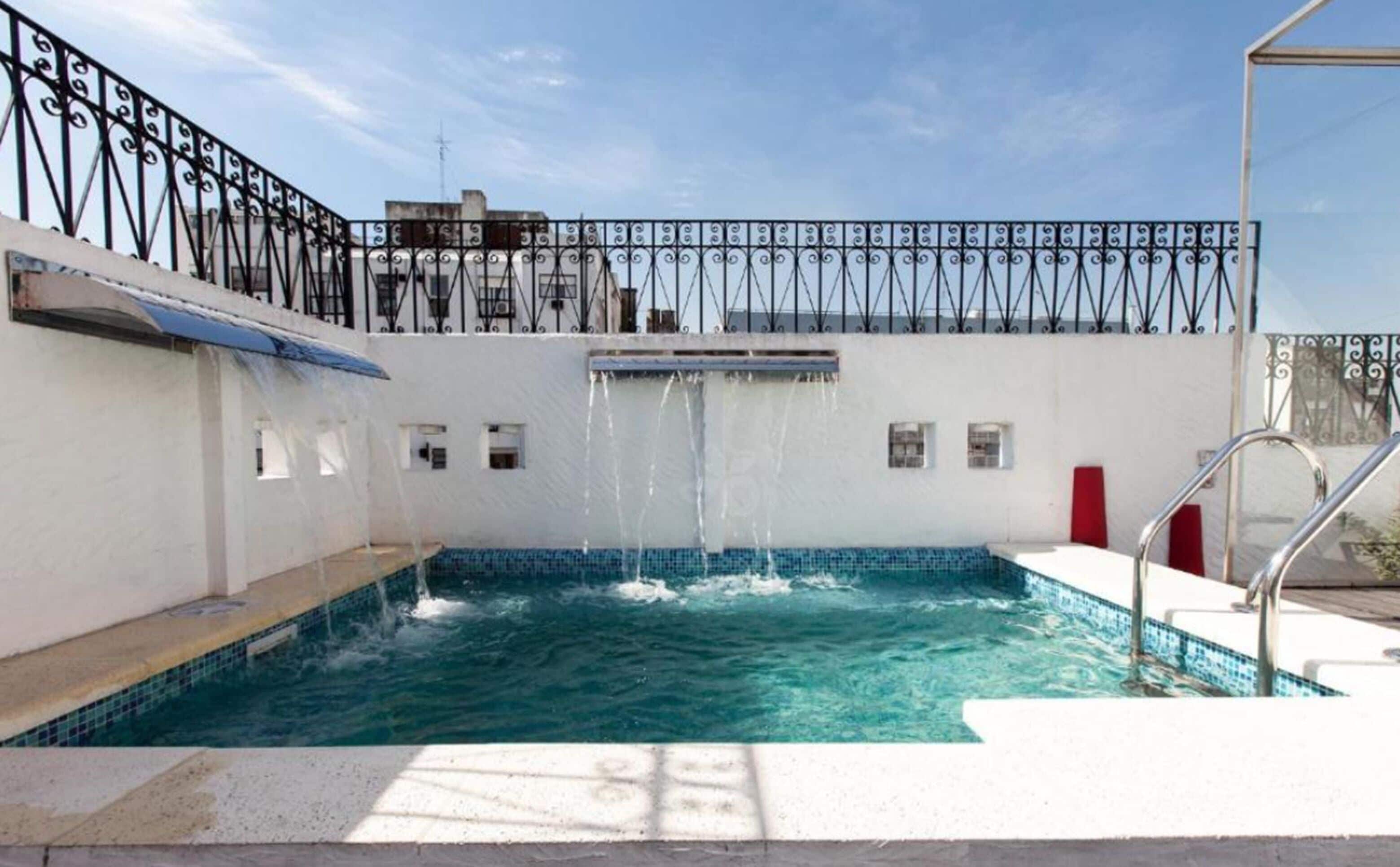 outdoor pool, open 8:00 am to 8:00 pm, pool umbrellas, pool loungers