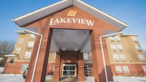 A building with the sign "LAKEVIEW" and a crown logo above the entrance.