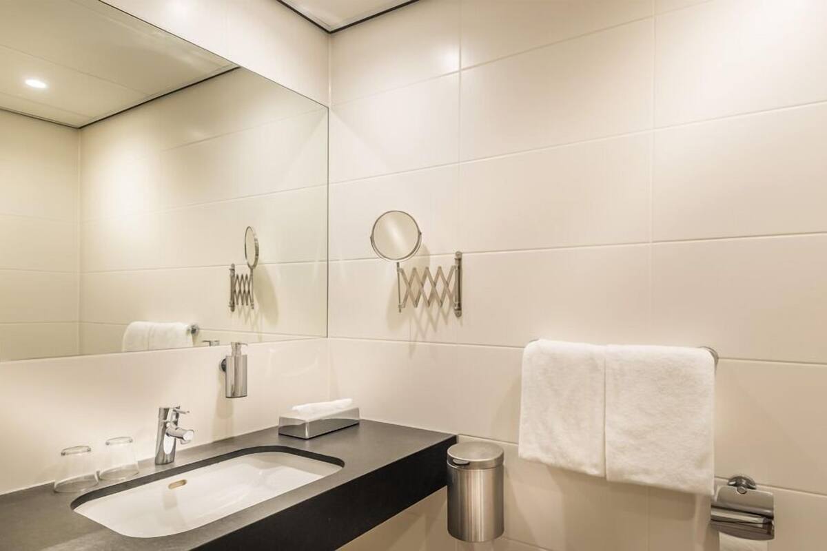 eco-friendly toiletries, hair dryer, towels, soap