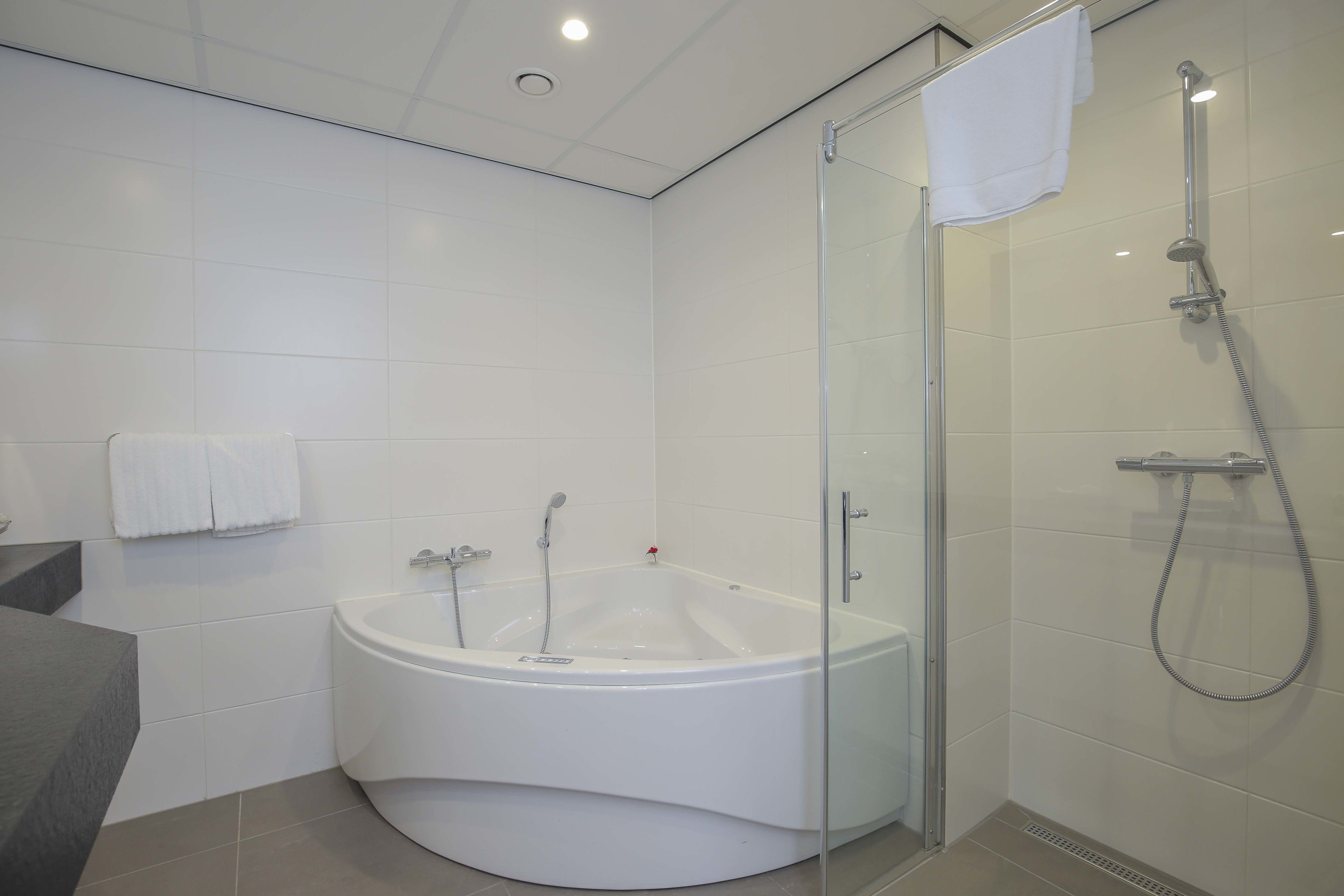 eco-friendly toiletries, hair dryer, towels, soap