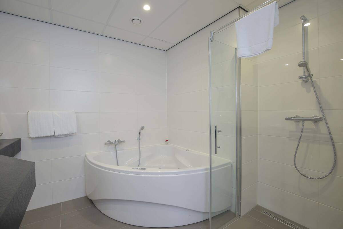 eco-friendly toiletries, hair dryer, towels, soap