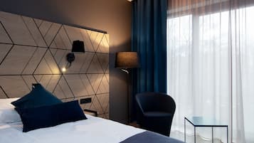 Superior Room | Minibar, in-room safe, desk, iron/ironing board