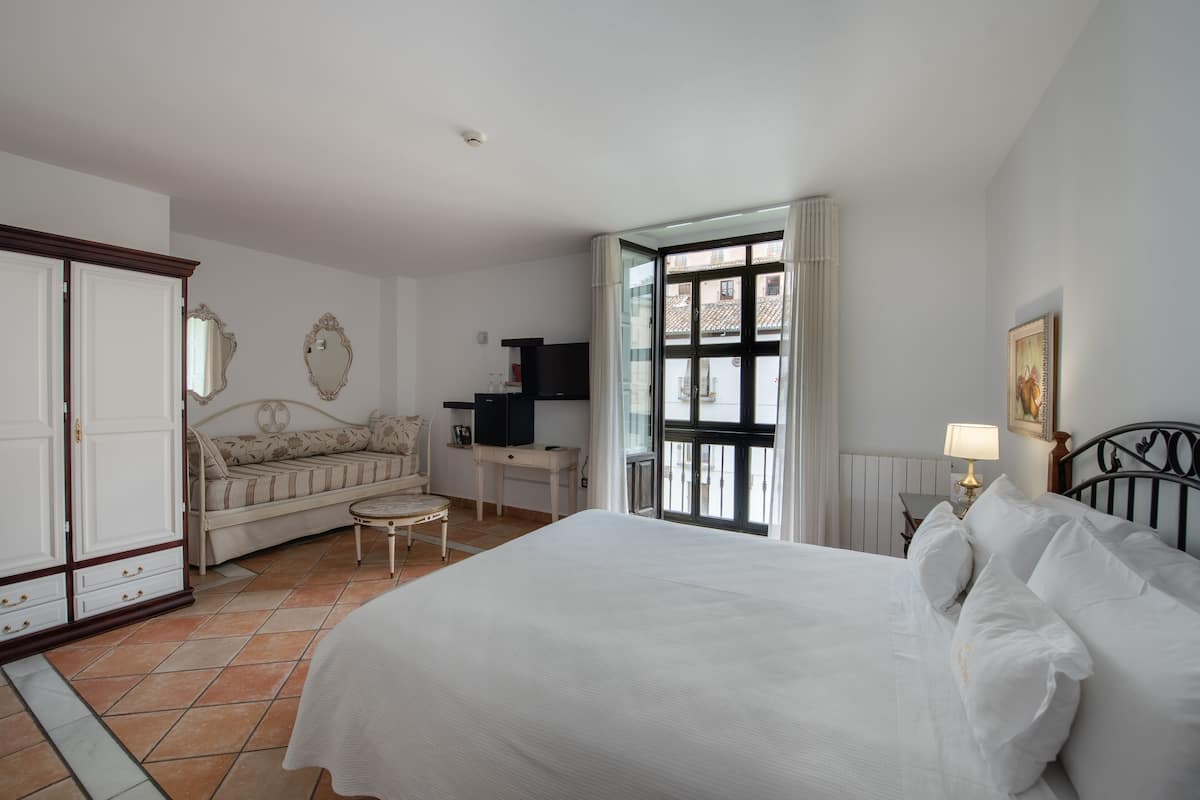 Junior Suite | 1 bedroom, down duvets, minibar, individually decorated