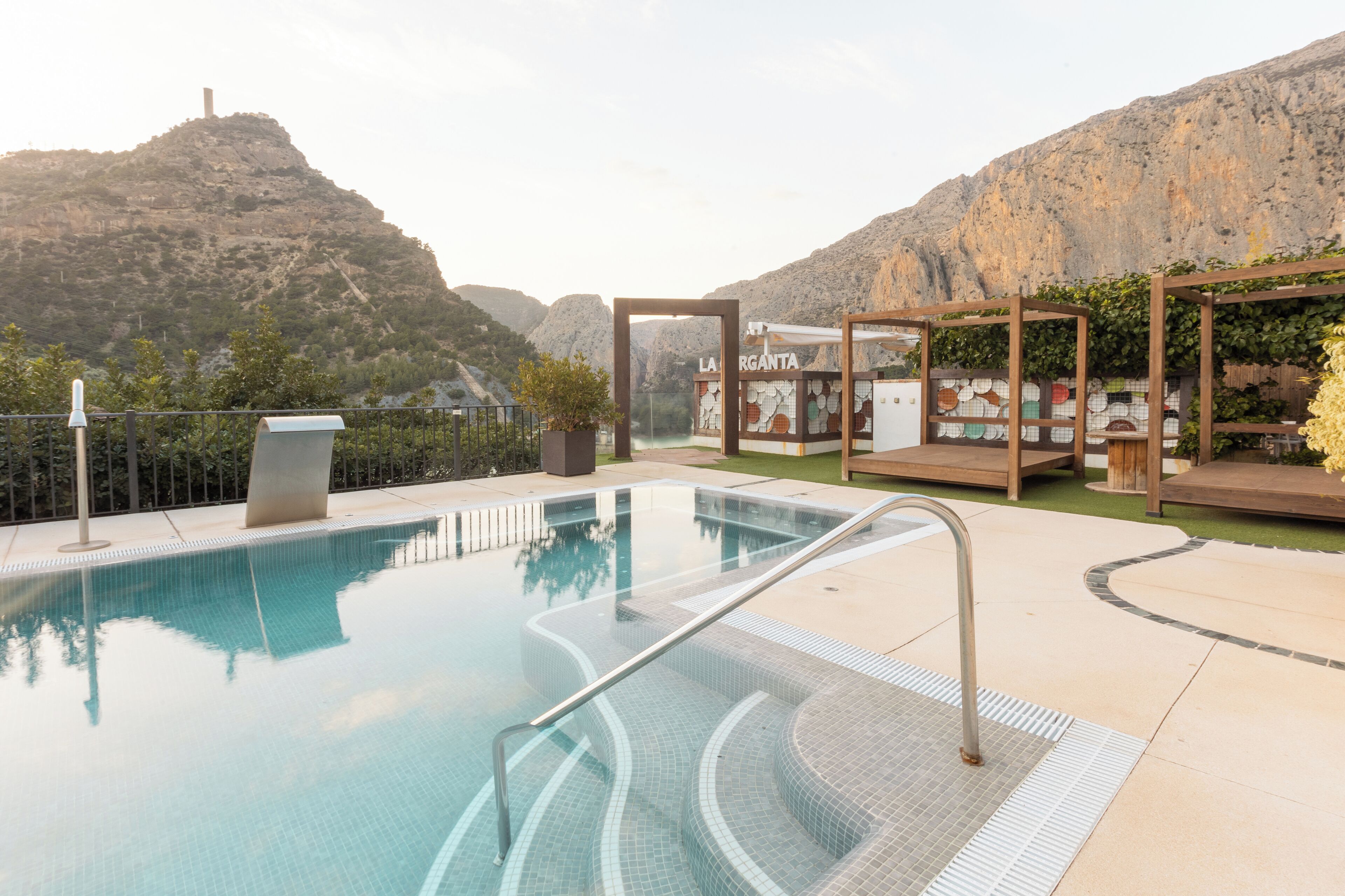 outdoor pool, pool umbrellas, pool loungers