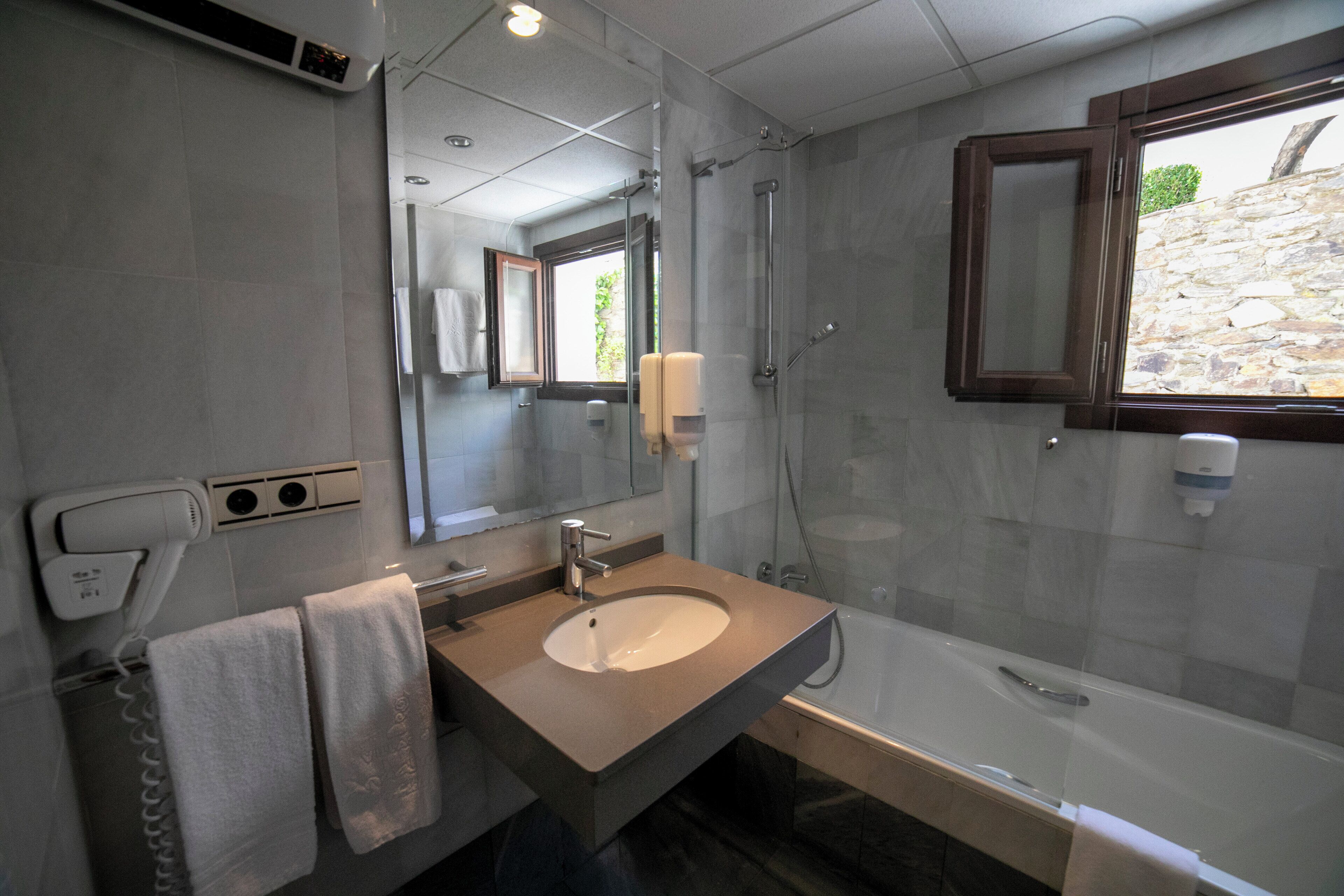 hair dryer, bidet, towels, soap