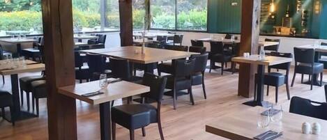 Breakfast, lunch, dinner served; garden views