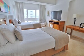 Ropa de cama de alta calidad, minibar, caja fuerte y escritorio