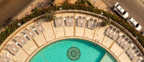 Outdoor pool, open 8:00 AM to 8:00 PM, pool umbrellas, sun loungers