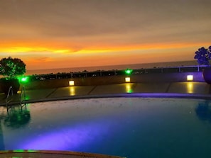 Outdoor pool, open 8:00 AM to 8:00 PM, pool umbrellas, pool loungers