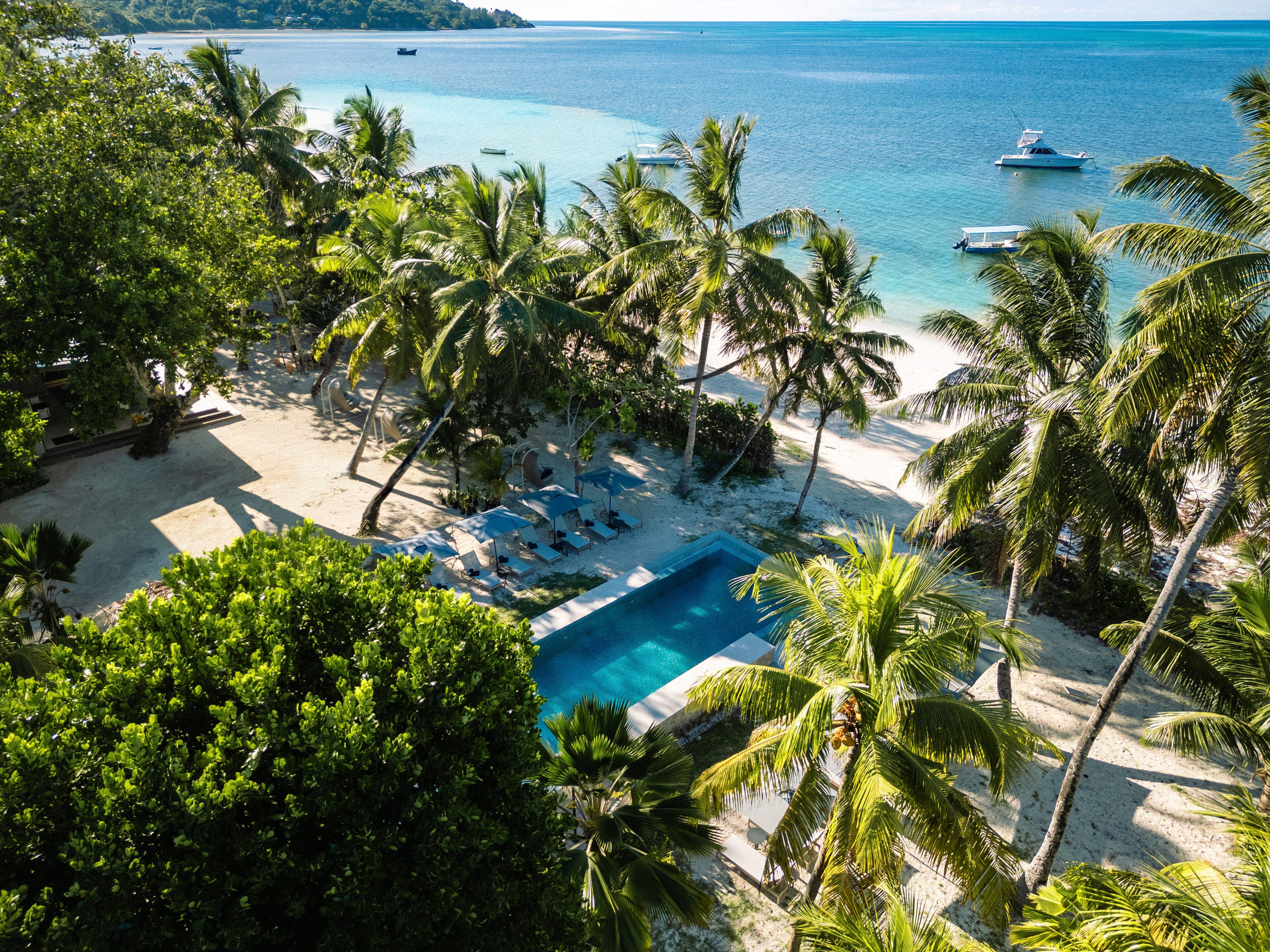 2 outdoor pools, open 7:30 AM to 7:30 PM, pool umbrellas, pool loungers