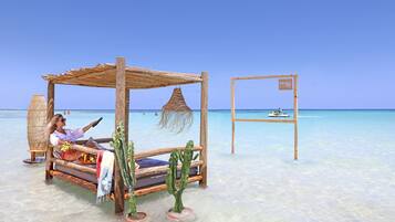 Private beach, white sand, beach towels, water skiing