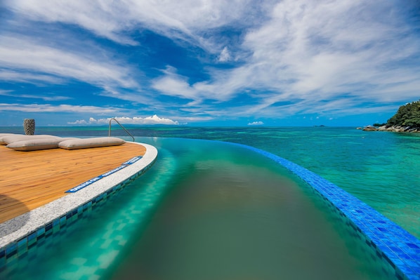 3 outdoor pools, pool umbrellas, sun loungers