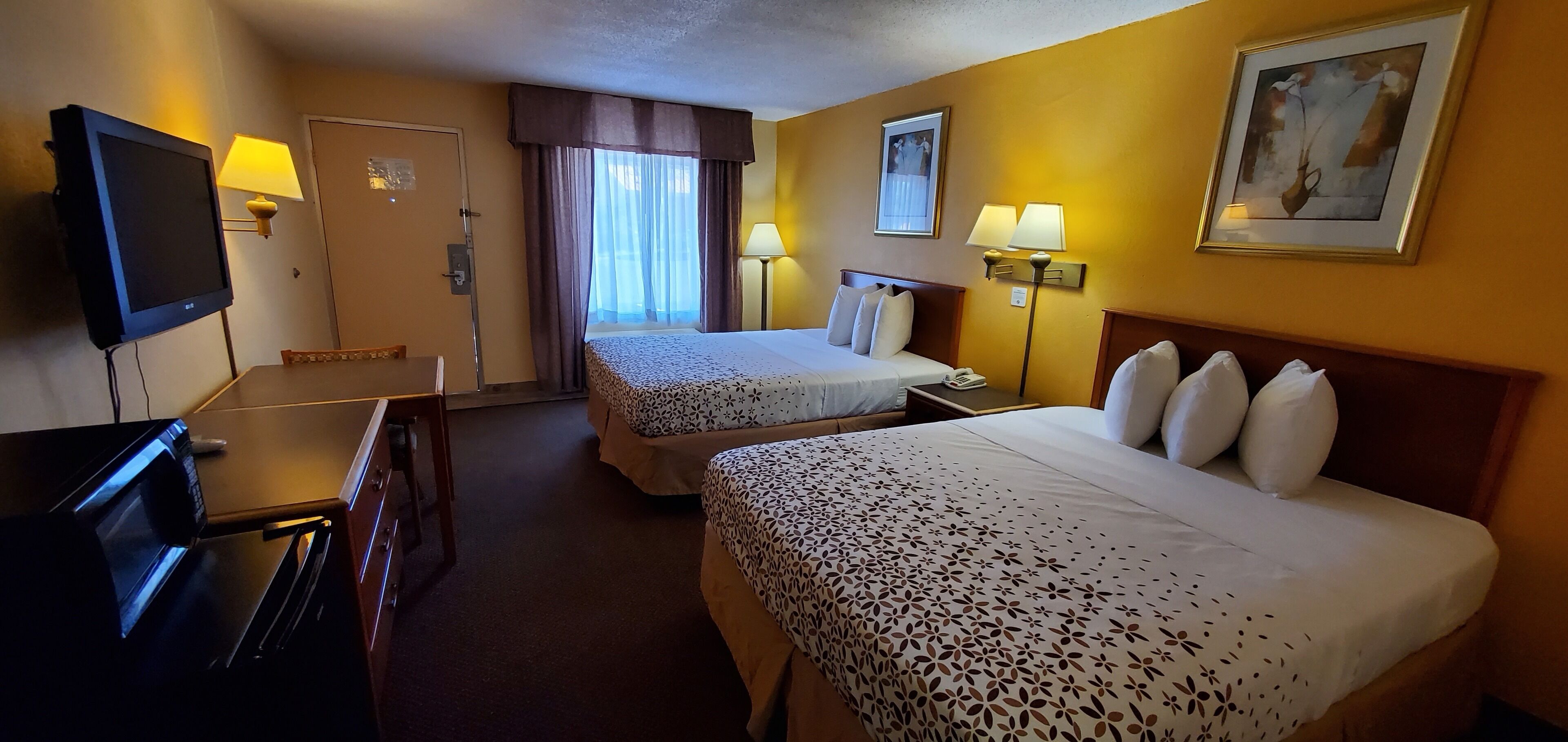 Standard Room, 2 Queen Beds, Non Smoking | Desk, laptop workspace, blackout drapes, iron/ironing board