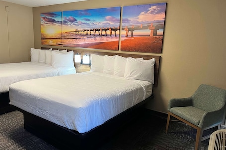 Pillowtop beds, blackout drapes, free WiFi, bed sheets