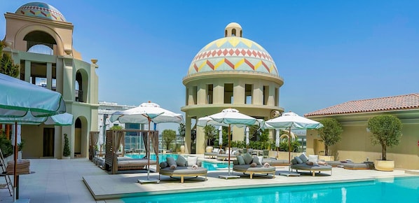 Outdoor pool, pool umbrellas, pool loungers