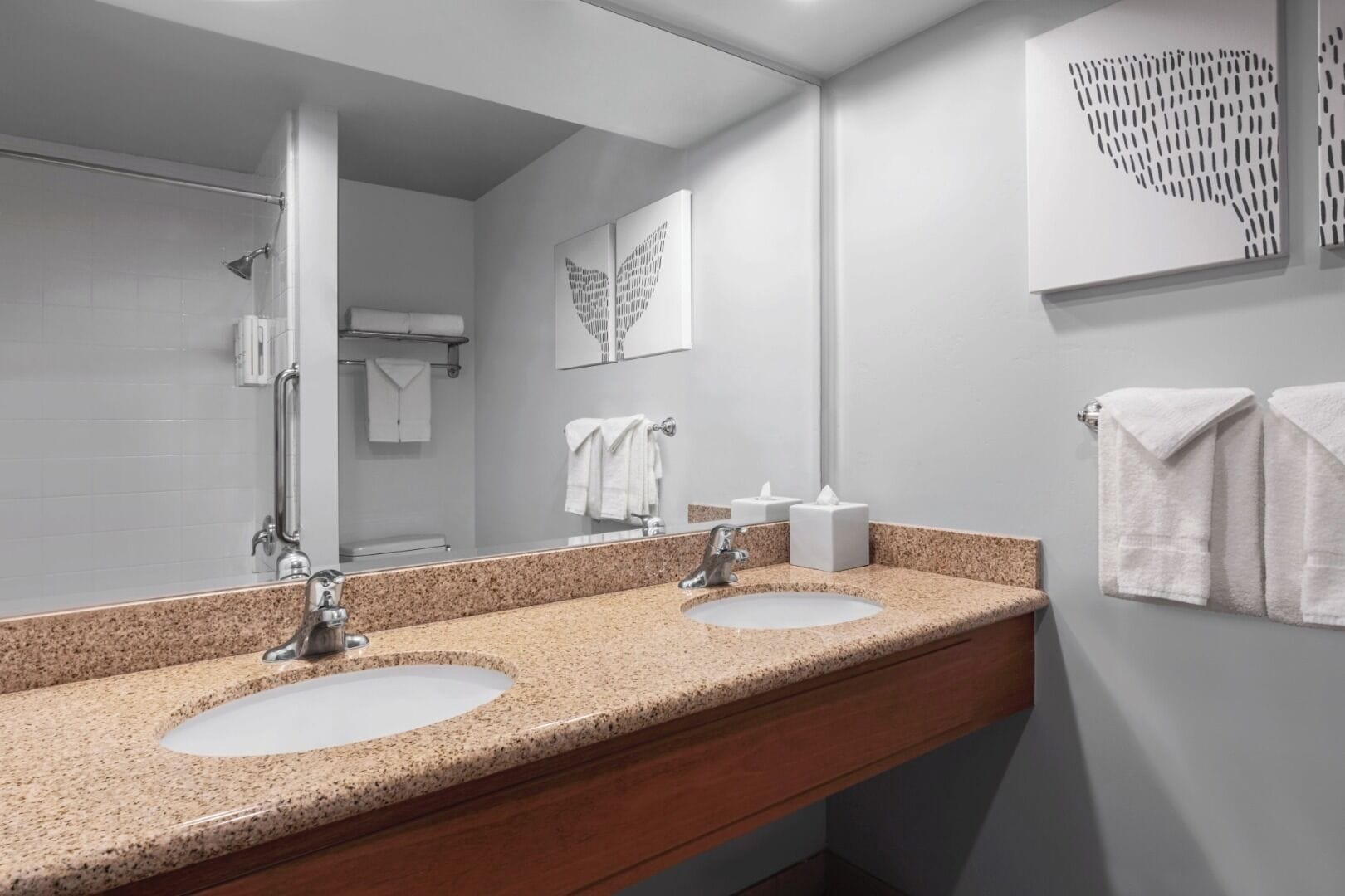 combined shower/bathtub, designer toiletries, hair dryer, bathrobes