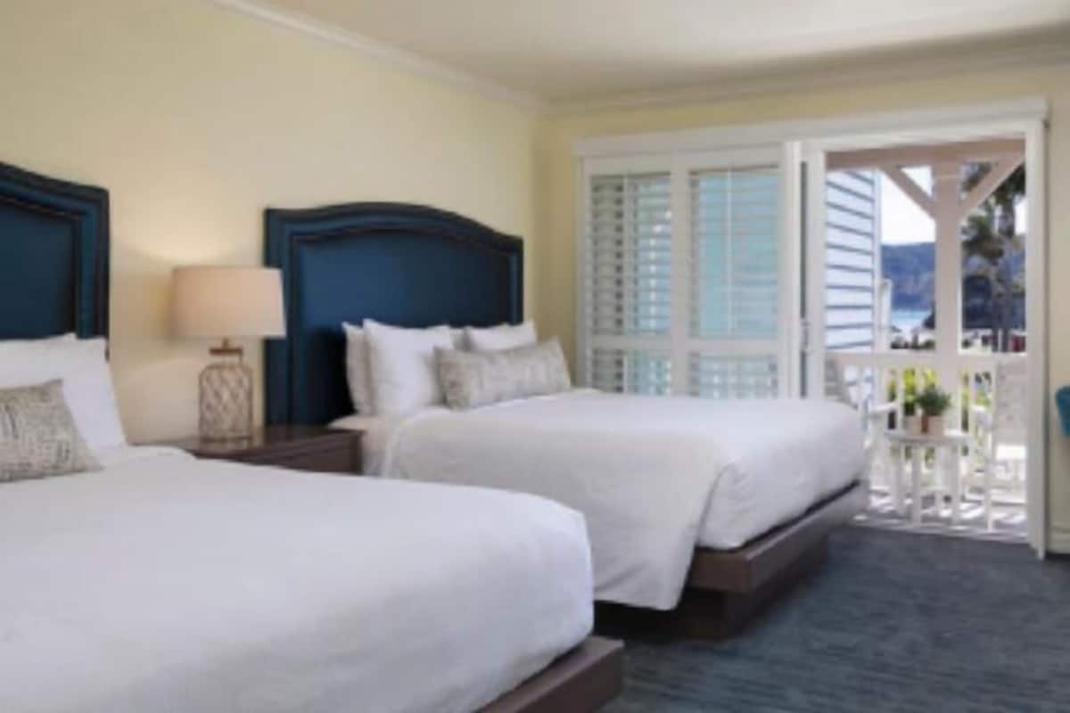 Premium bedding, down comforters, pillowtop beds, minibar