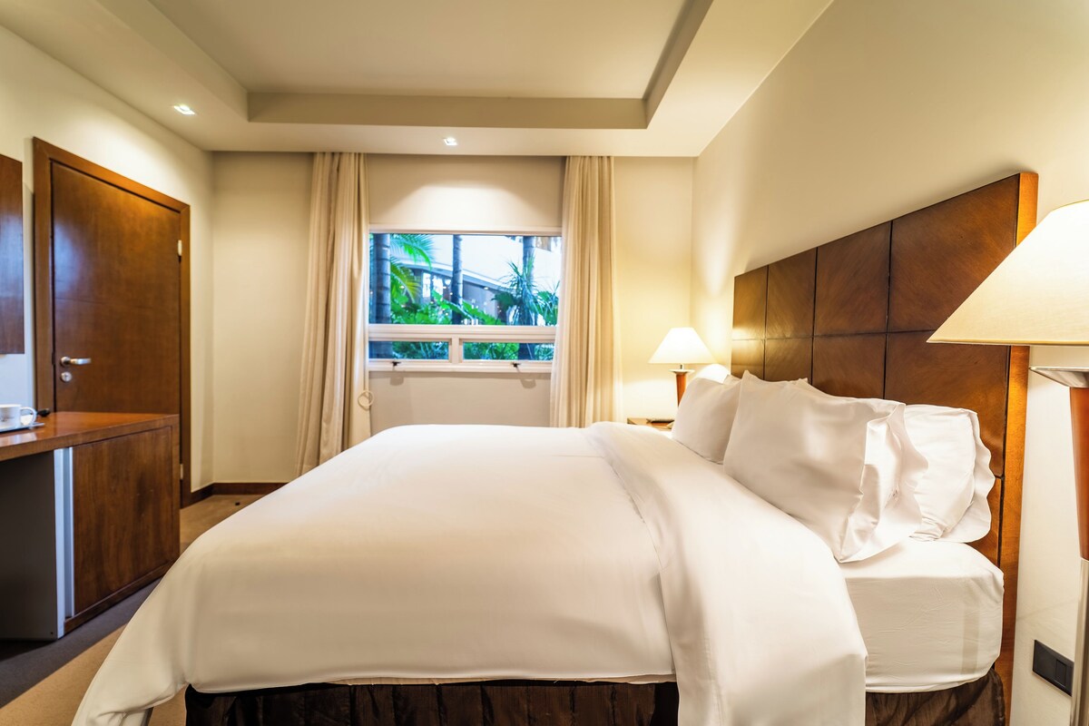Premium bedding, down comforters, Select Comfort beds, minibar