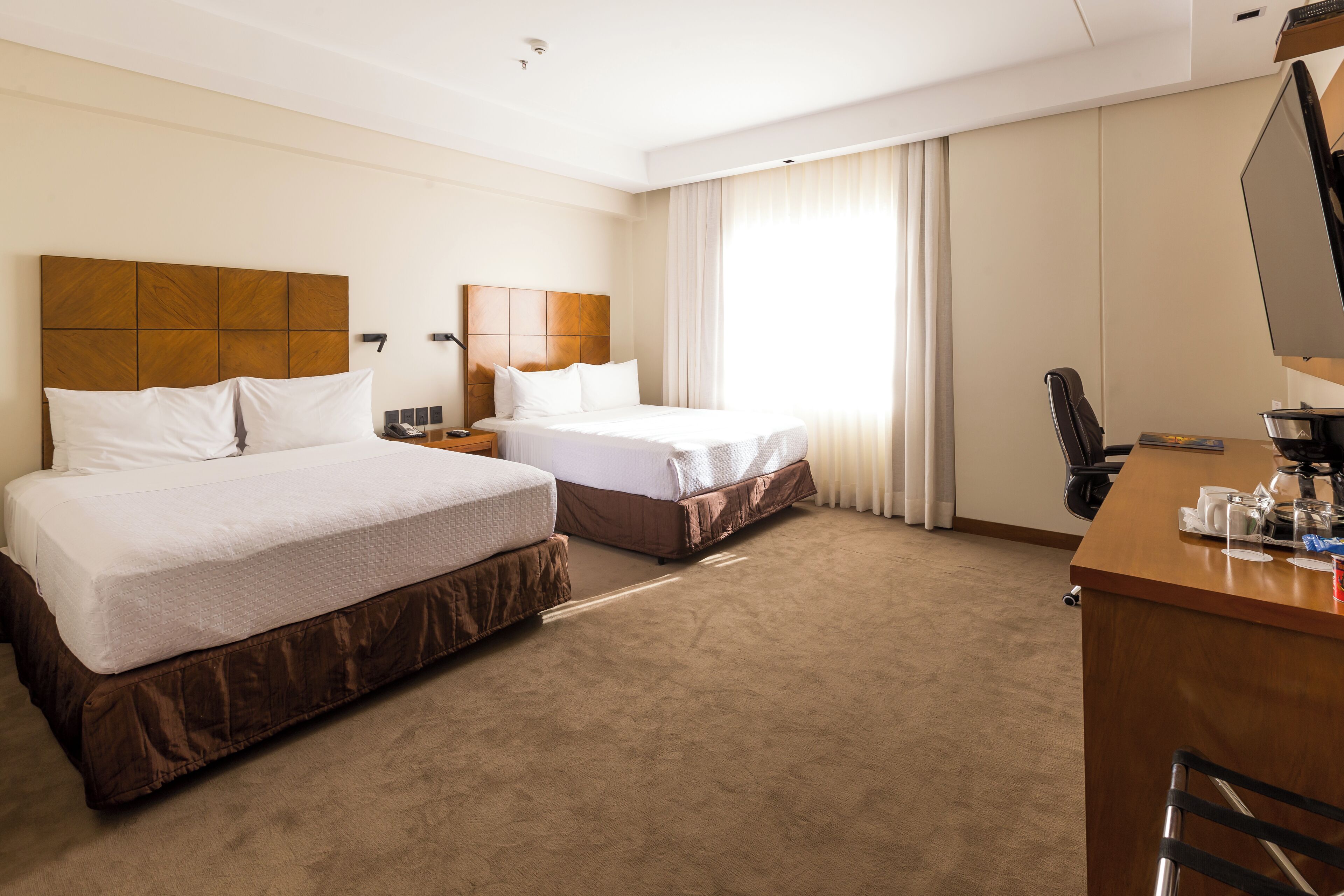 Premium bedding, down duvets, Select Comfort beds, minibar