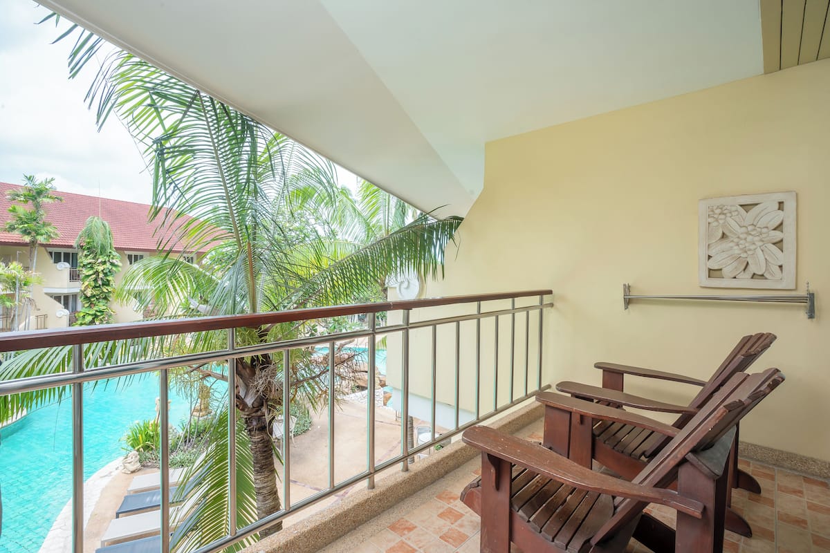 Quadruple Room With Balcony -No Pet | 1 bedroom, minibar, in-room safe, individually decorated