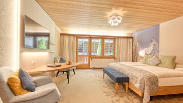 Habitación familiar | Camas con pillow-top, minibar y caja de seguridad en la habitación