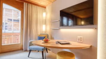 Colchones con pillow-top, minibar y caja de seguridad en la habitación