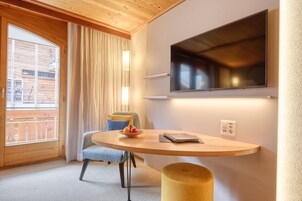 Colchones con pillow-top, minibar y caja de seguridad en la habitación 