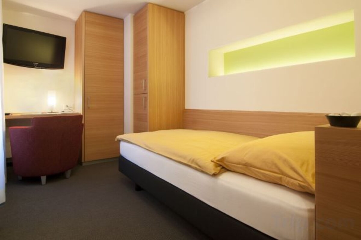 Camas con pillow-top, minibar y caja de seguridad en la habitación 