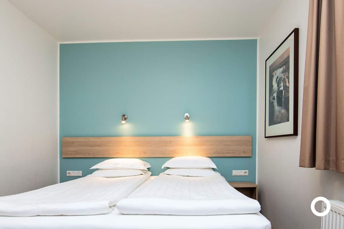 Minibar, desk, laptop workspace, blackout drapes