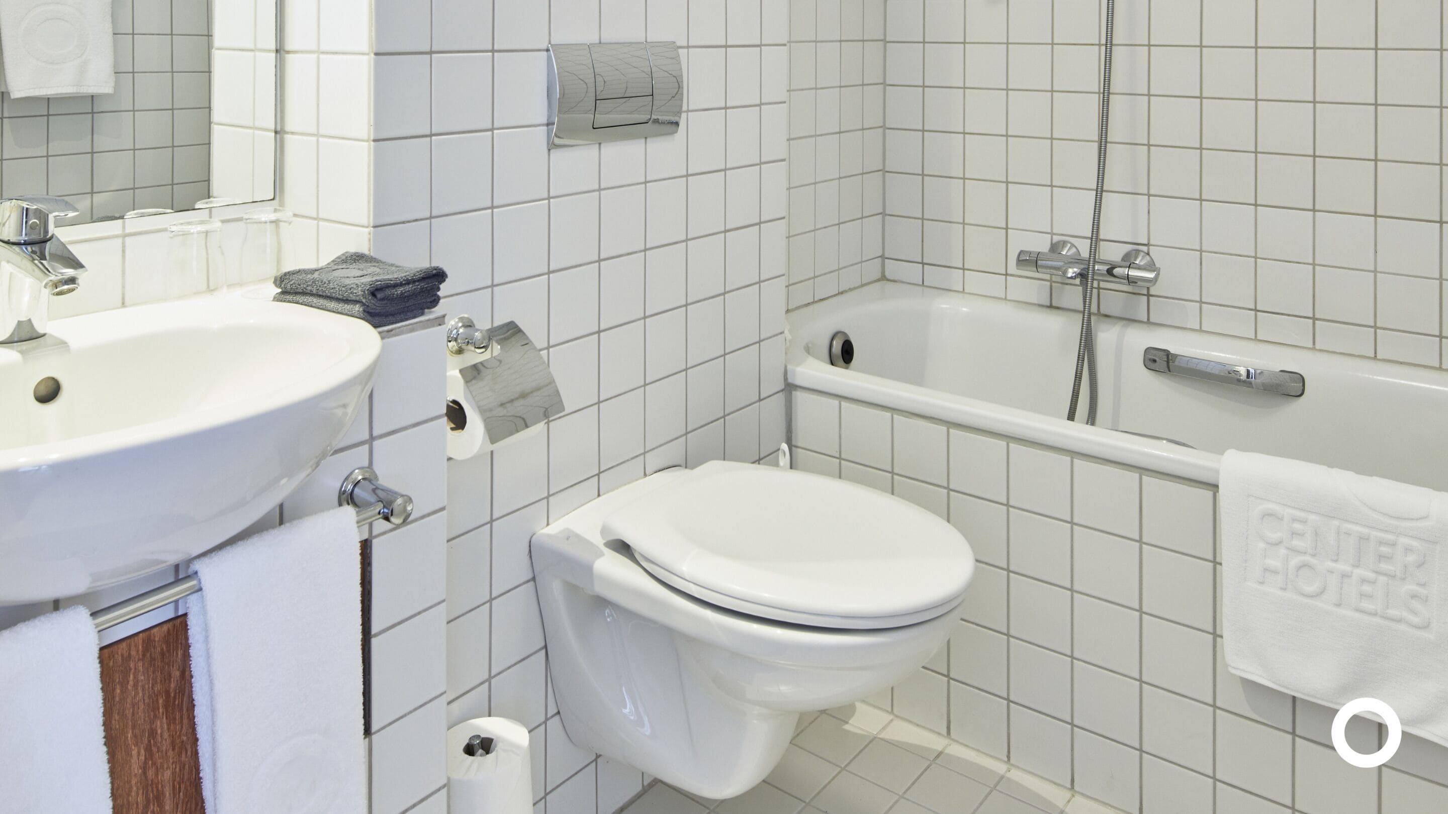 eco-friendly toiletries, hair dryer, towels