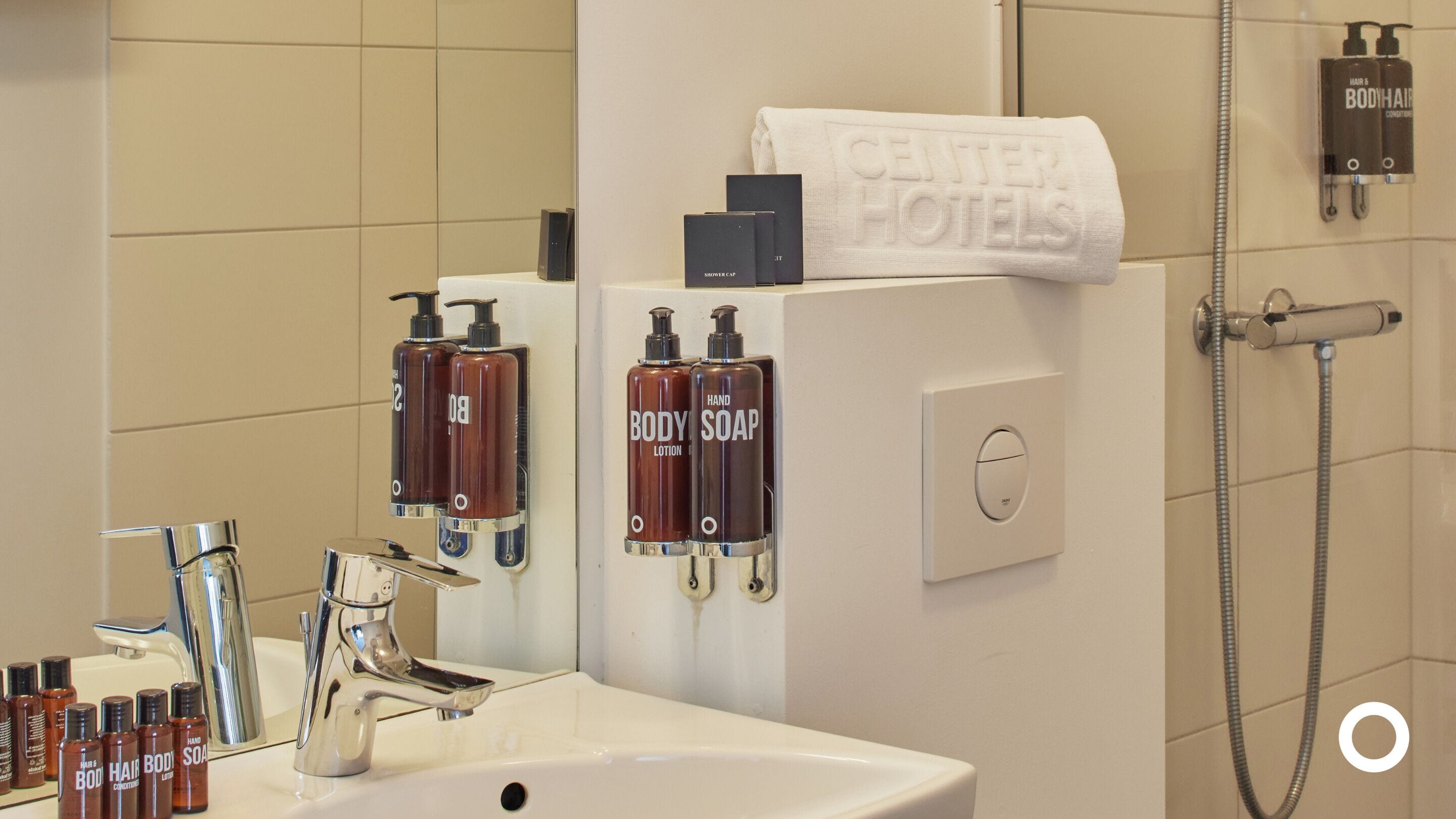 eco-friendly toiletries, hair dryer, towels