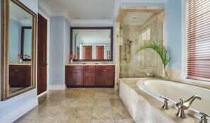 Separate tub and shower, jetted tub, designer toiletries, hair dryer