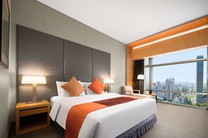 Ropa de cama de alta calidad, minibar, caja fuerte y escritorio