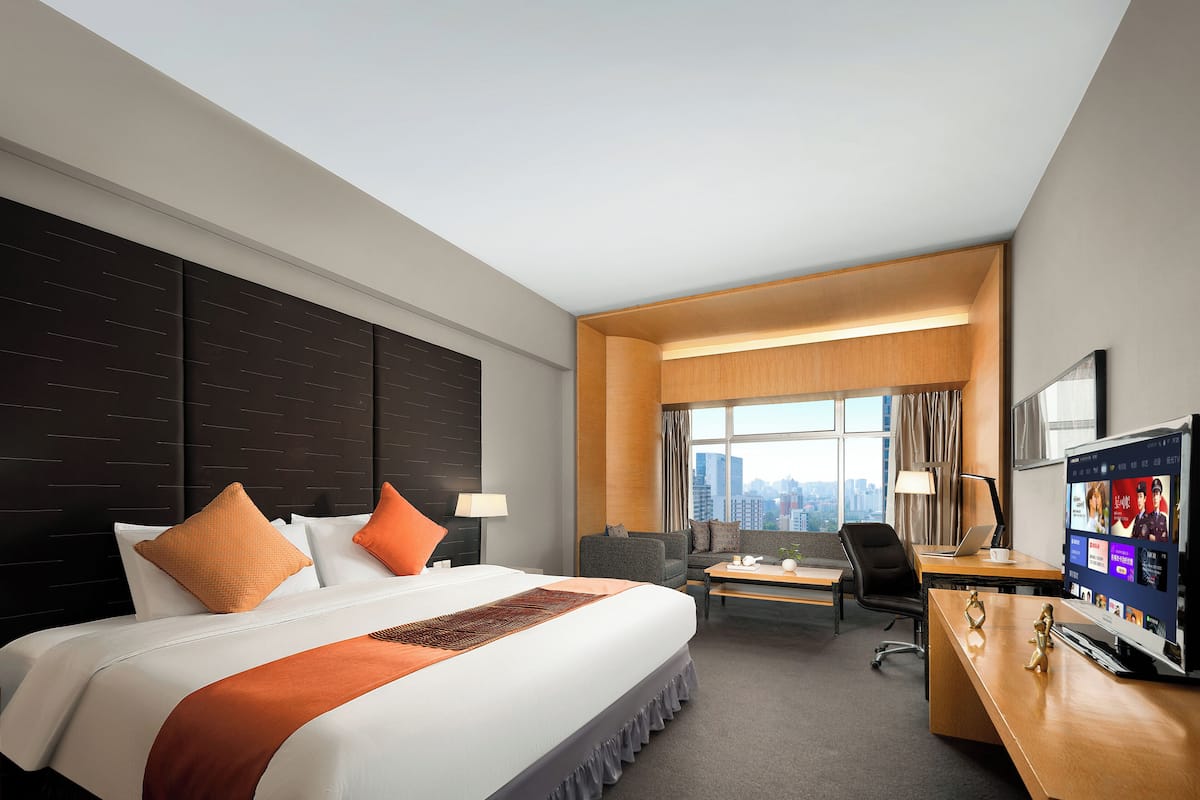 Suite superior | Ropa de cama de alta calidad y minibar