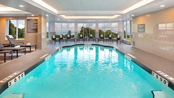 Indoor pool, open 6:00 AM to 10:00 PM, pool loungers