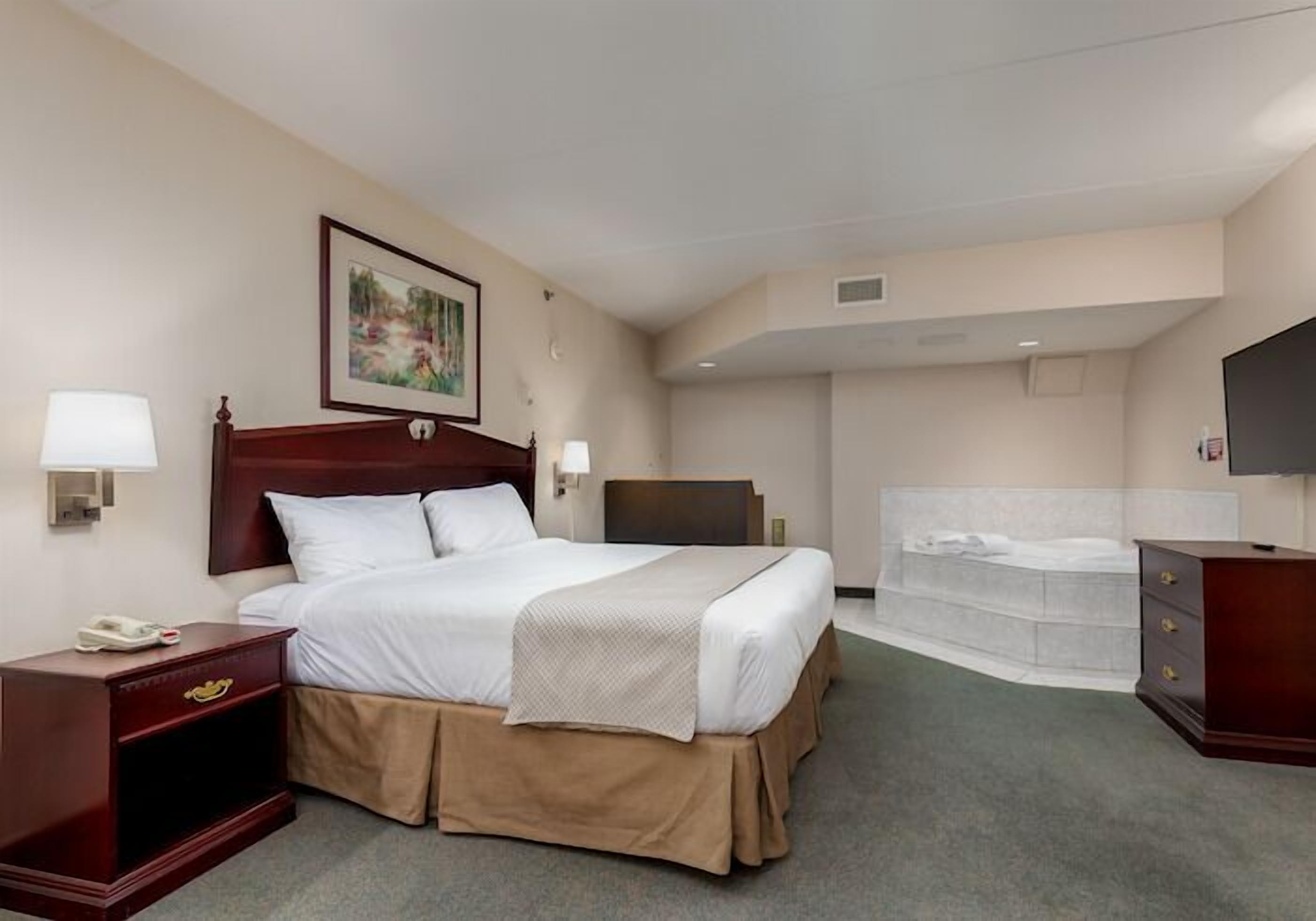 Suite Exécutive, 1 chambre, baignoire  à jets | Bureau, fer et planche à repasser, Wi-Fi gratuit, draps fournis