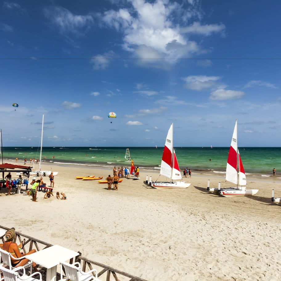 Private beach, white sand, sun loungers, beach umbrellas