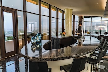 One 80 Suite | Living area | 65-inch LCD TV with cable channels, Smart TV, Netflix at Red Rock Casino, Resort and Spa