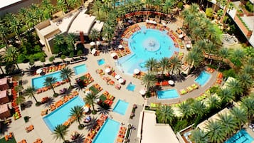 Outdoor pool, open 9 AM to 6 PM, cabanas (surcharge), pool umbrellas
