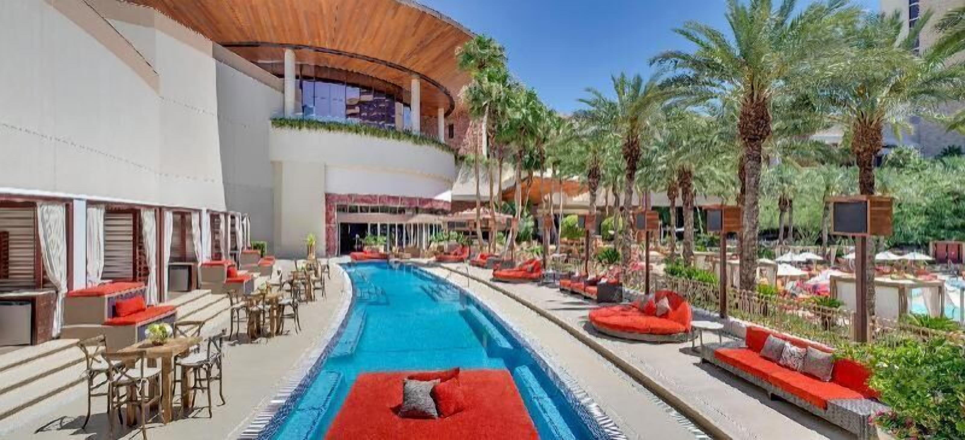 Pool | Outdoor pool, open 9 AM to 6 PM, cabanas (surcharge), pool umbrellas