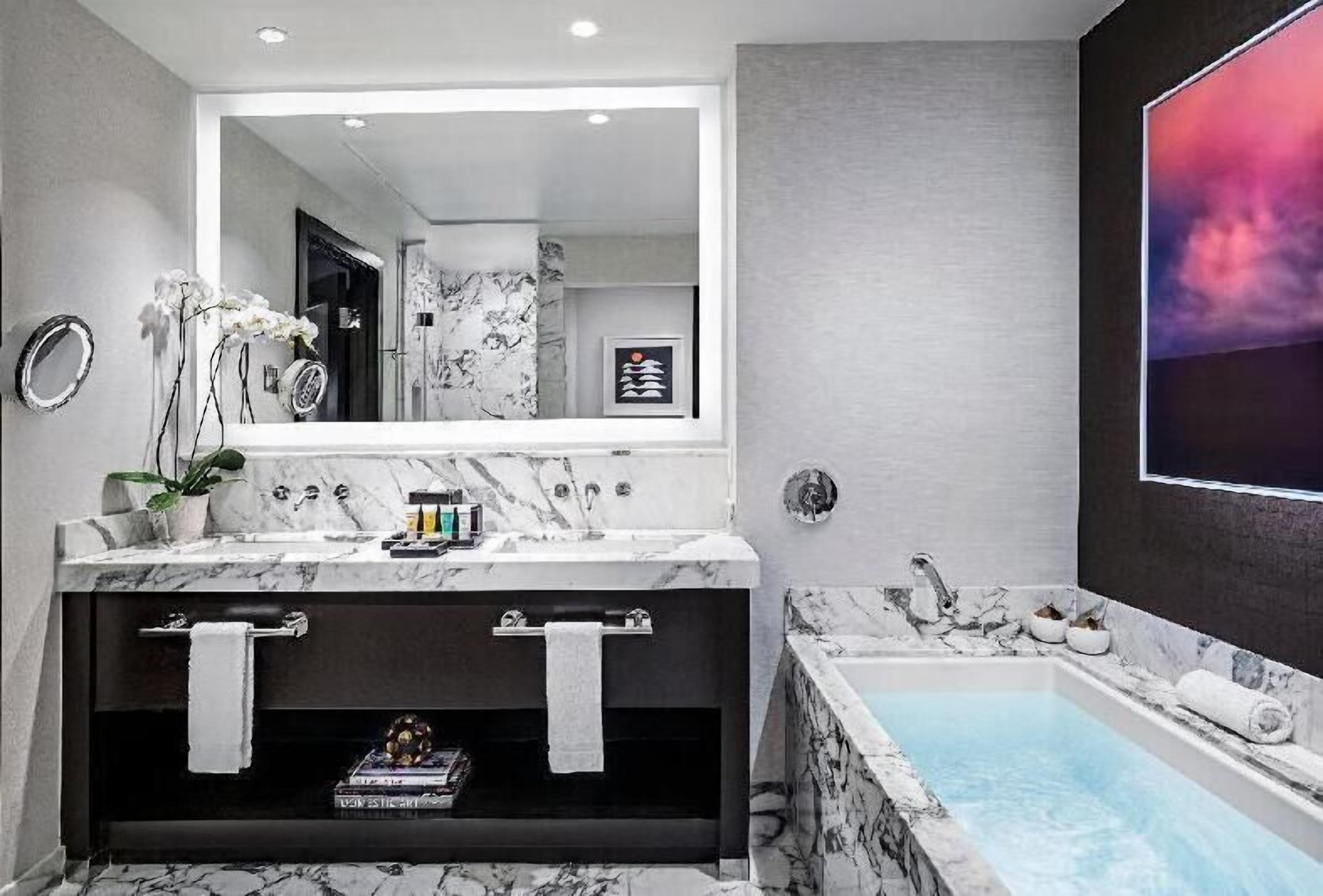 Bathroom | Designer toiletries, hair dryer, bathrobes, towels