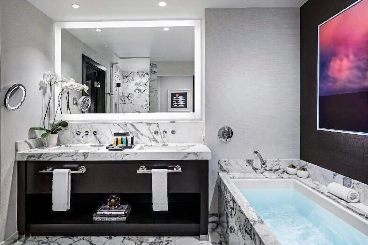 Bathroom | Designer toiletries, hair dryer, bathrobes, towels