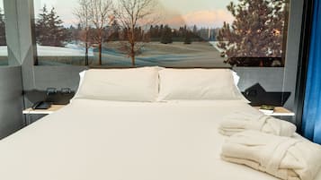 Premium bedding, down comforters, minibar, in-room safe