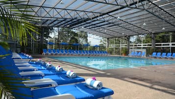 Indoor pool, outdoor pool, pool umbrellas, sun loungers