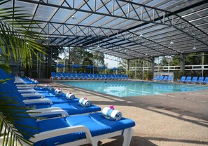 Indoor pool, outdoor pool, pool umbrellas, sun loungers