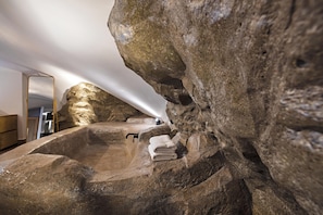 Rocabella Suite Caldera View with Outdoor Mini Plunge Pool Quadruple | Bathroom | Shower, rainfall showerhead, designer toiletries, hair dryer