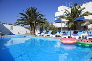 Outdoor pool, open 8 AM to 9 PM, pool umbrellas, sun loungers