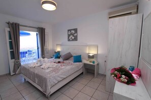 Quadruple Room, 2 Bedrooms | In-room safe, blackout drapes, iron/ironing board (on request)