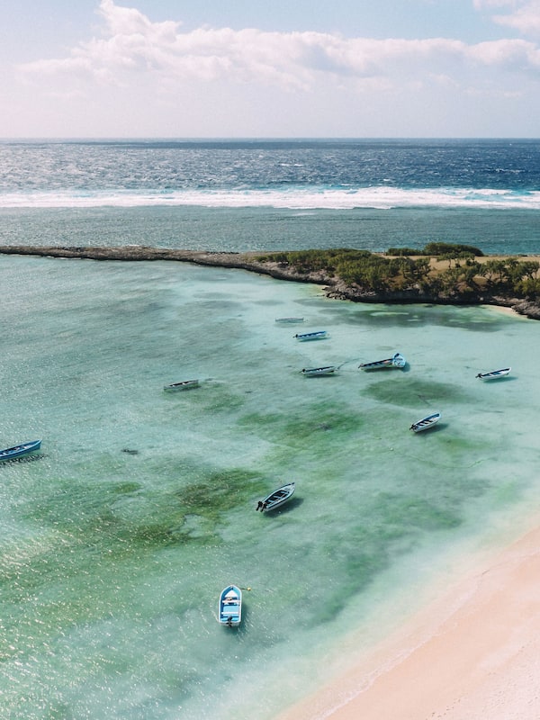 On the beach, white sand, beach towels, scuba diving